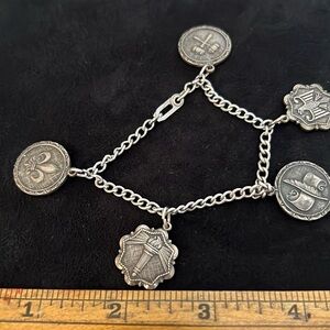 Vintage stamped Sterling Silver bracelet and charms